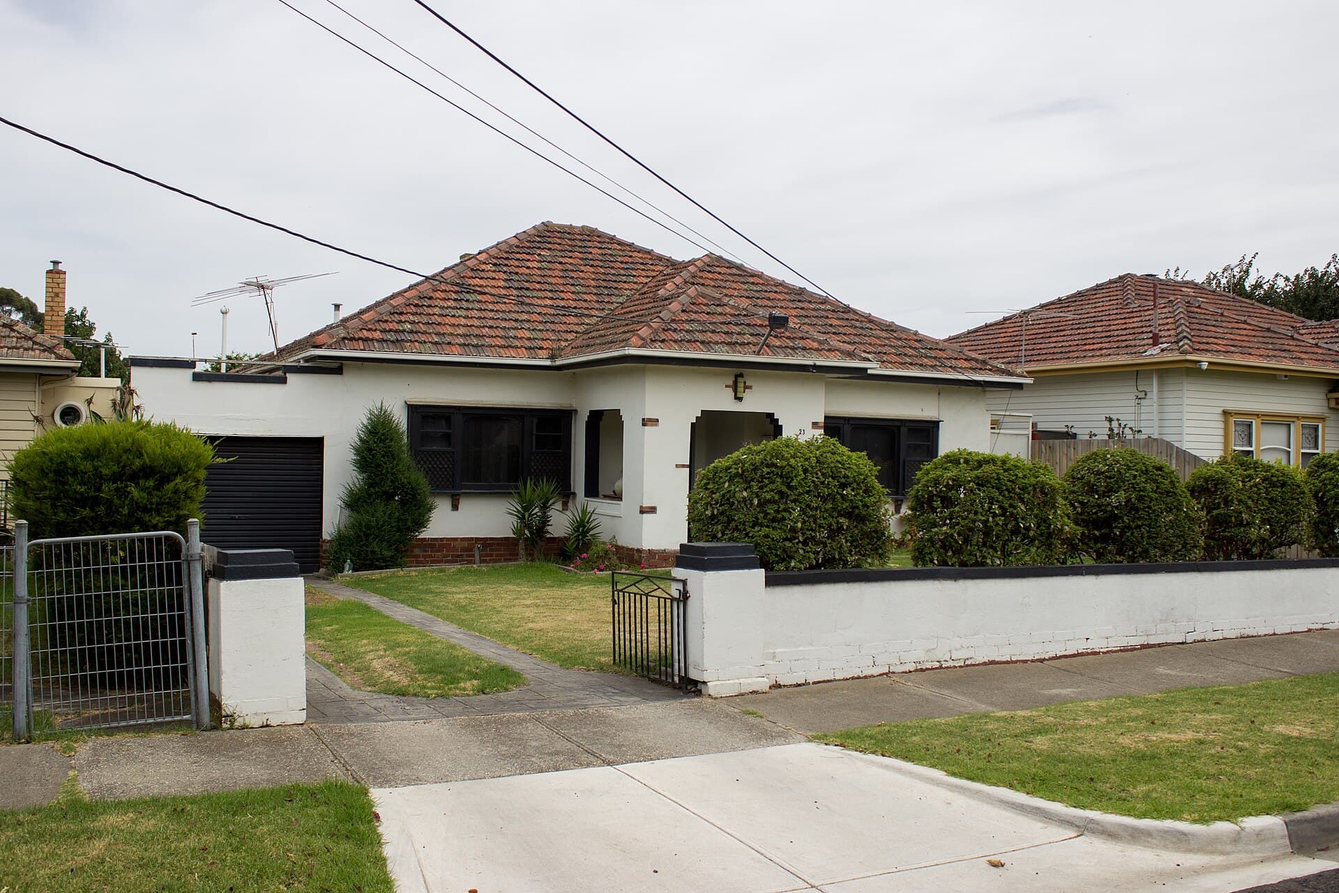 A weatherboard house on a suburban street in Sunshine, Victoria
