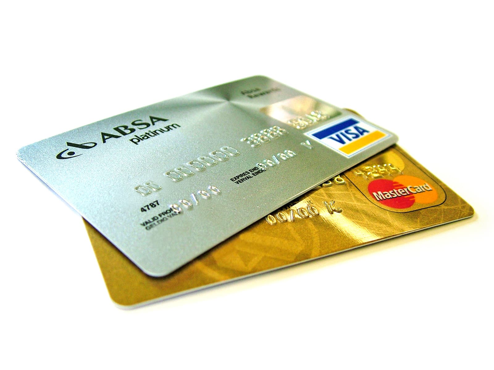 Close view of colourful payment cards fanned on a desk